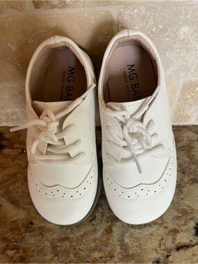 MG Baby White Faux Leather Oxford Dress Shoes are a classic and formal